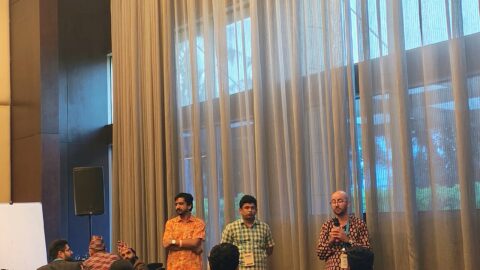 Audience seated at a conference session