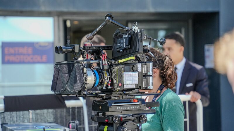 Film camera on a production set with crew