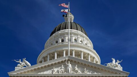 California State Capitol dome against a blue sky