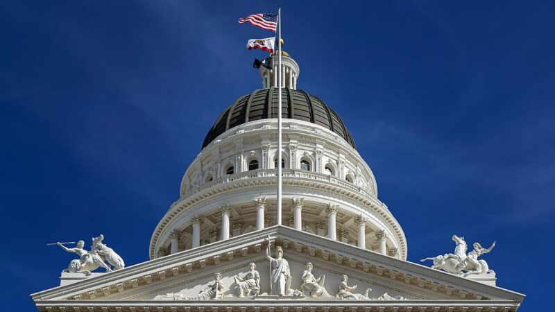 California State Capitol dome against a blue sky
