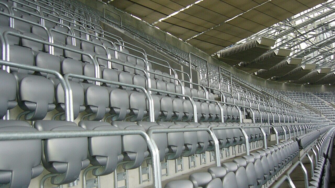 Empty arena seating in a large stadium