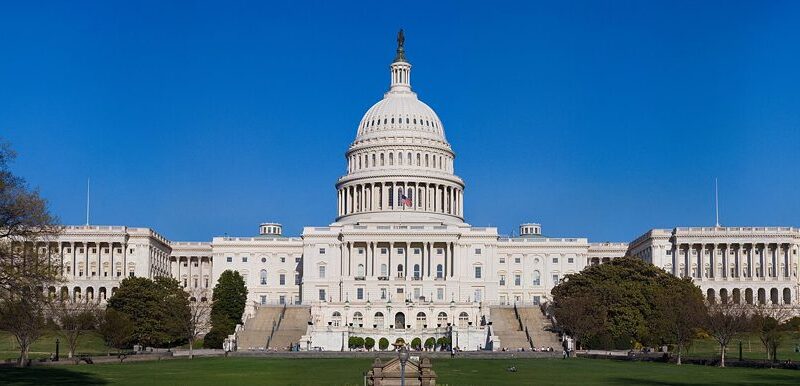 US Capitol building under a clear blue sky