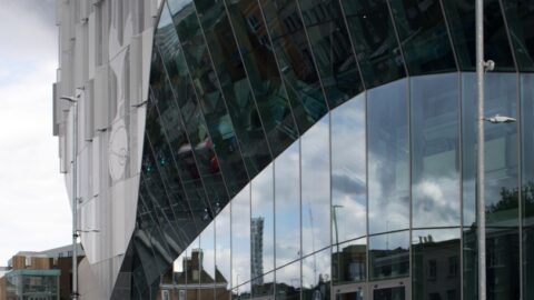Tottenham Hotspur Stadium glass exterior on NFL London game day